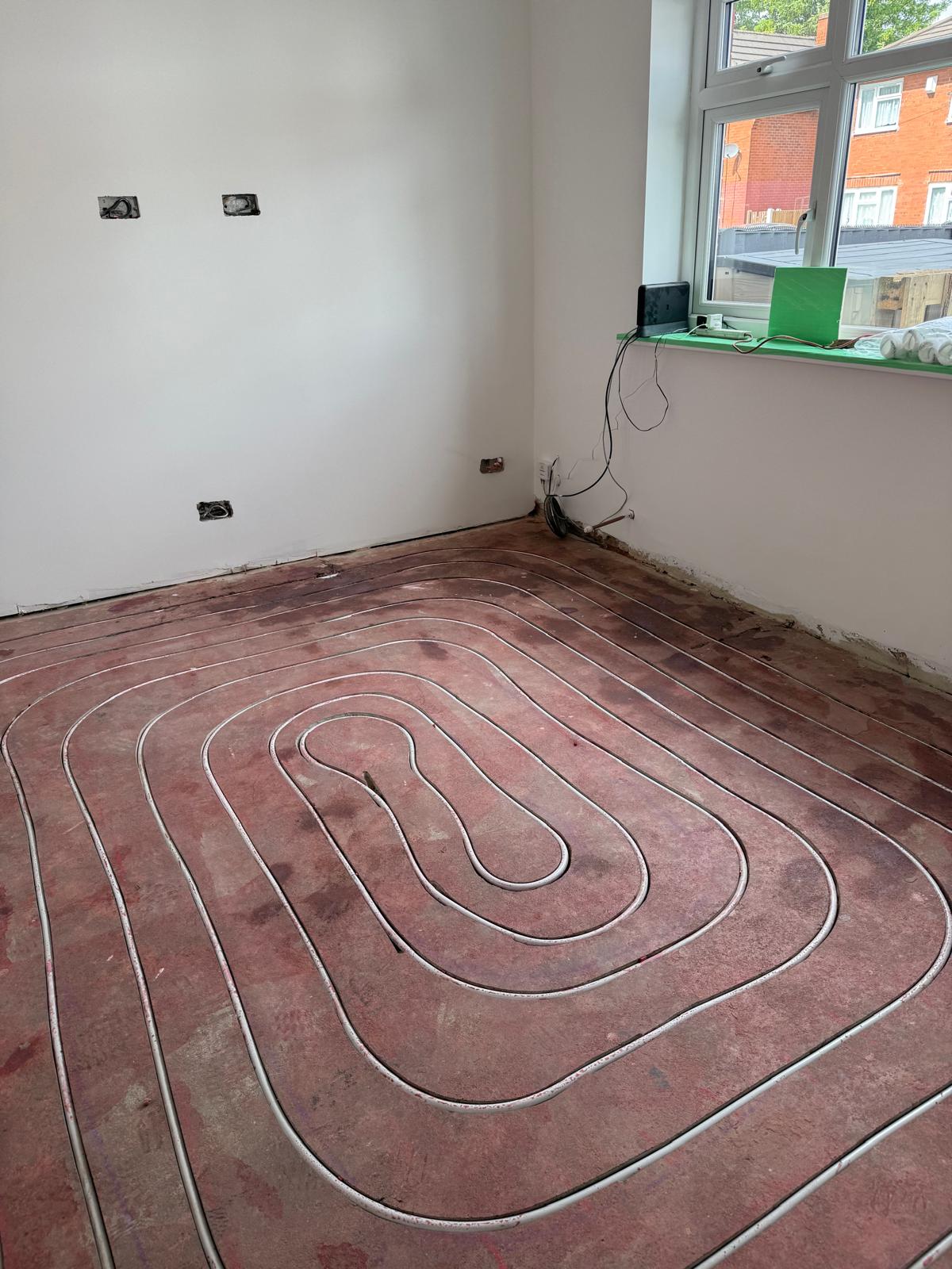 Precision-milled UFH channels through existing concrete slab