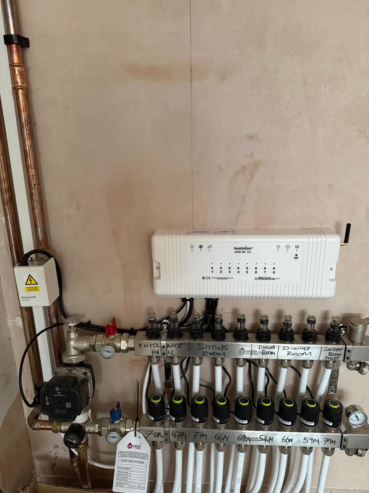 Heatmiser manifold connected to flow and return pipework