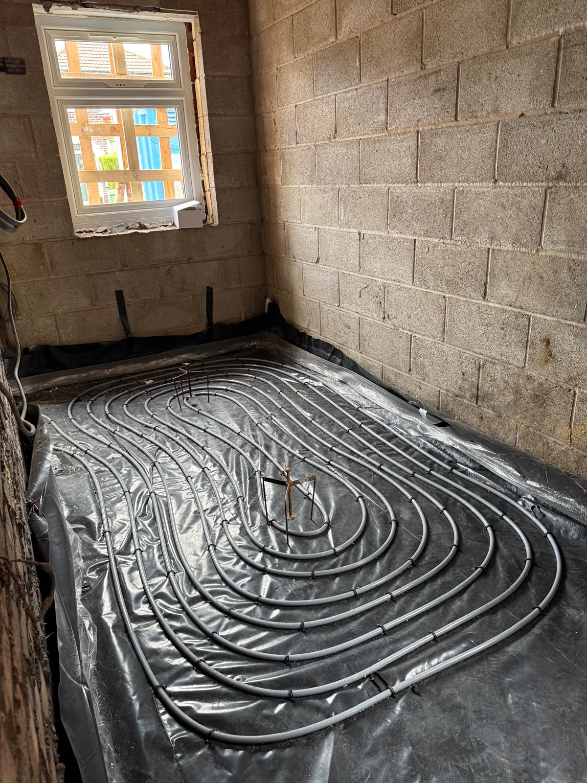UFH pipework laid and clipped ready for screed in a Cheshire retrofit